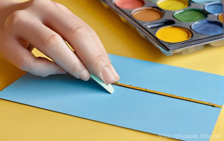 종이카드 만들기 - A brightly lit, clean craft table showcasing an array of essential card-making materials. In the for...